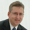 Monte K. Zysset And Dr. Daniel J. Tylka, Oral, Facial, And Implant Surgery Center Dental Implant